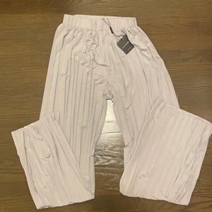 Brand new pleated silver wide leg pants. Size S.